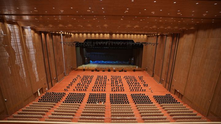 Inside a full auditorium at UBCC