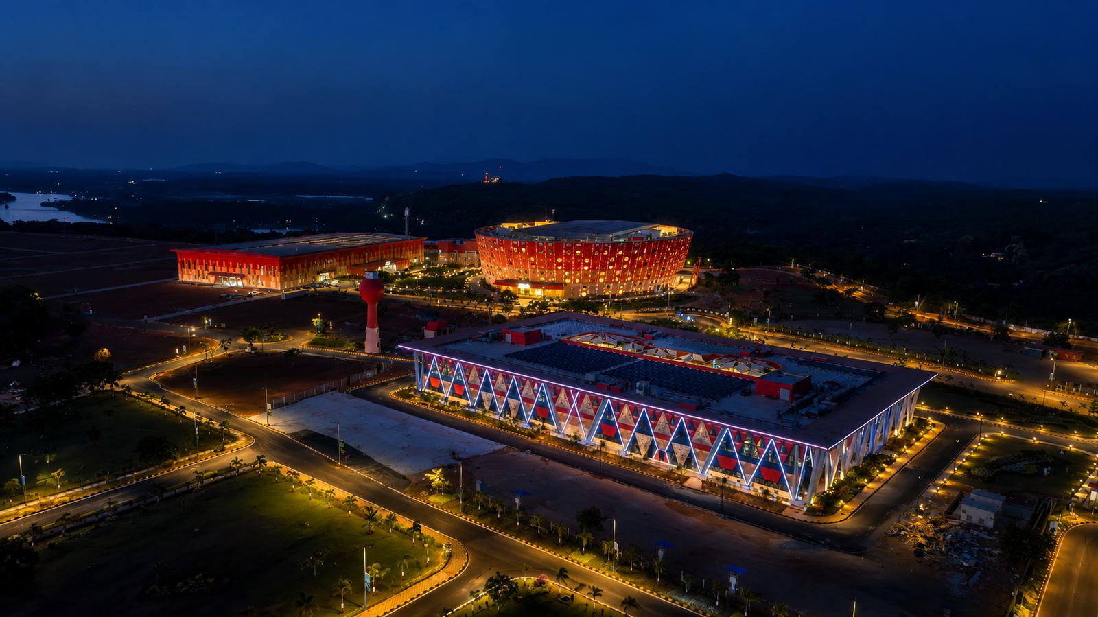 The UBCC campus illuminated at dusk